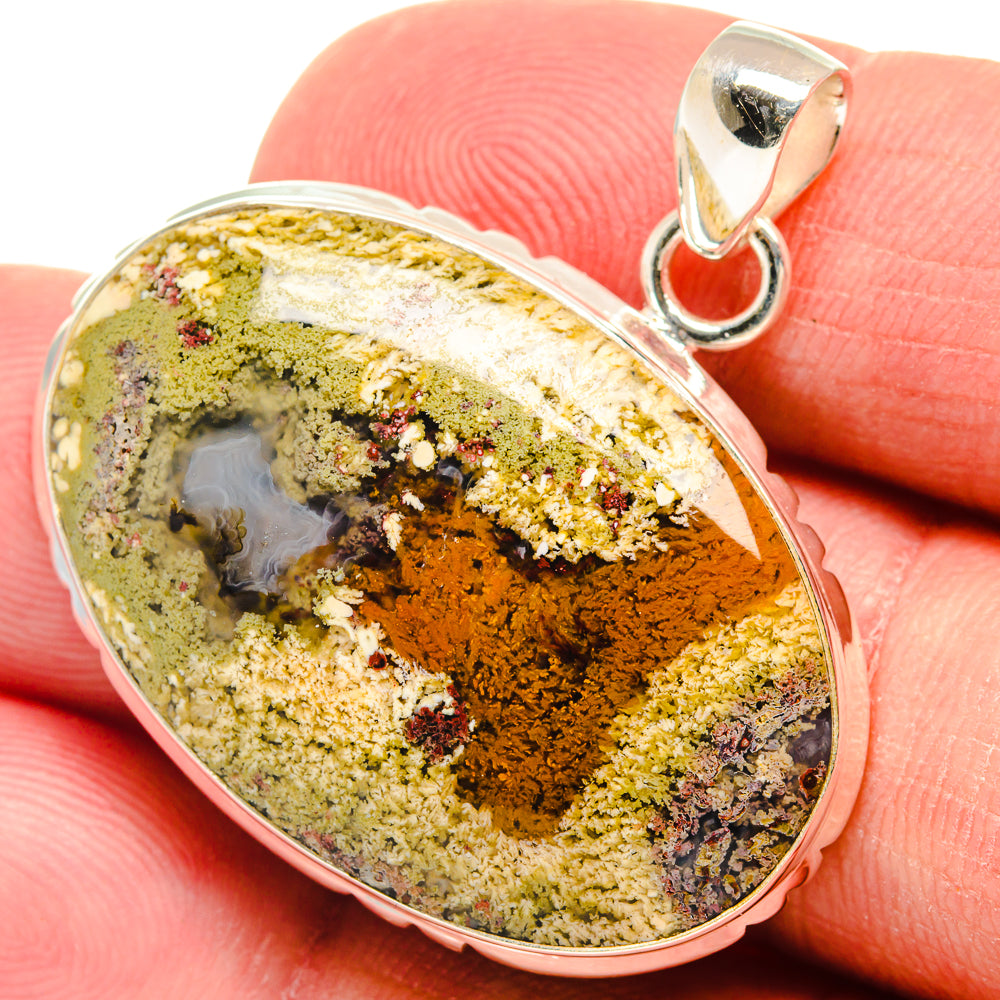 Oval plume agate pendant in 925 sterling silver, silver bail and frame