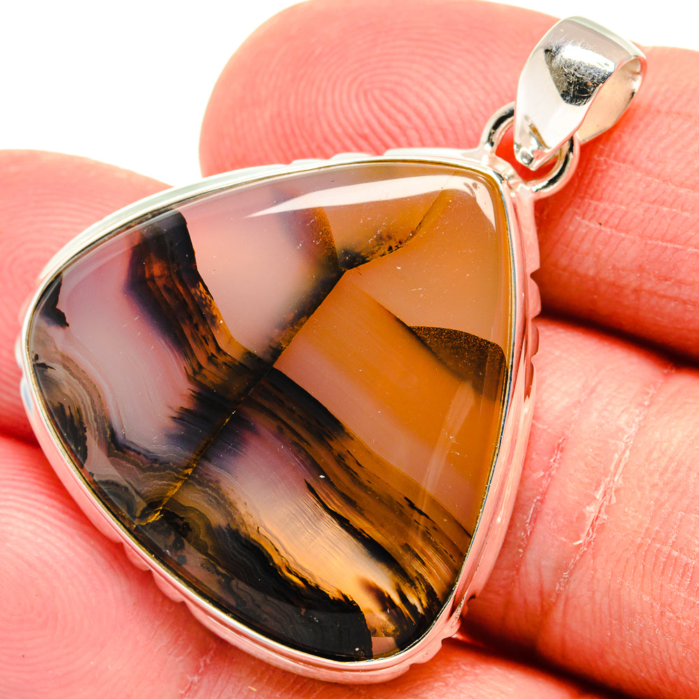Sterling silver bail and triangular amber agate pendant, black and gold swirl pattern