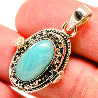 925 sterling silver larimar pendant with oval turquoise cabochon, ornate bezel, loop bail