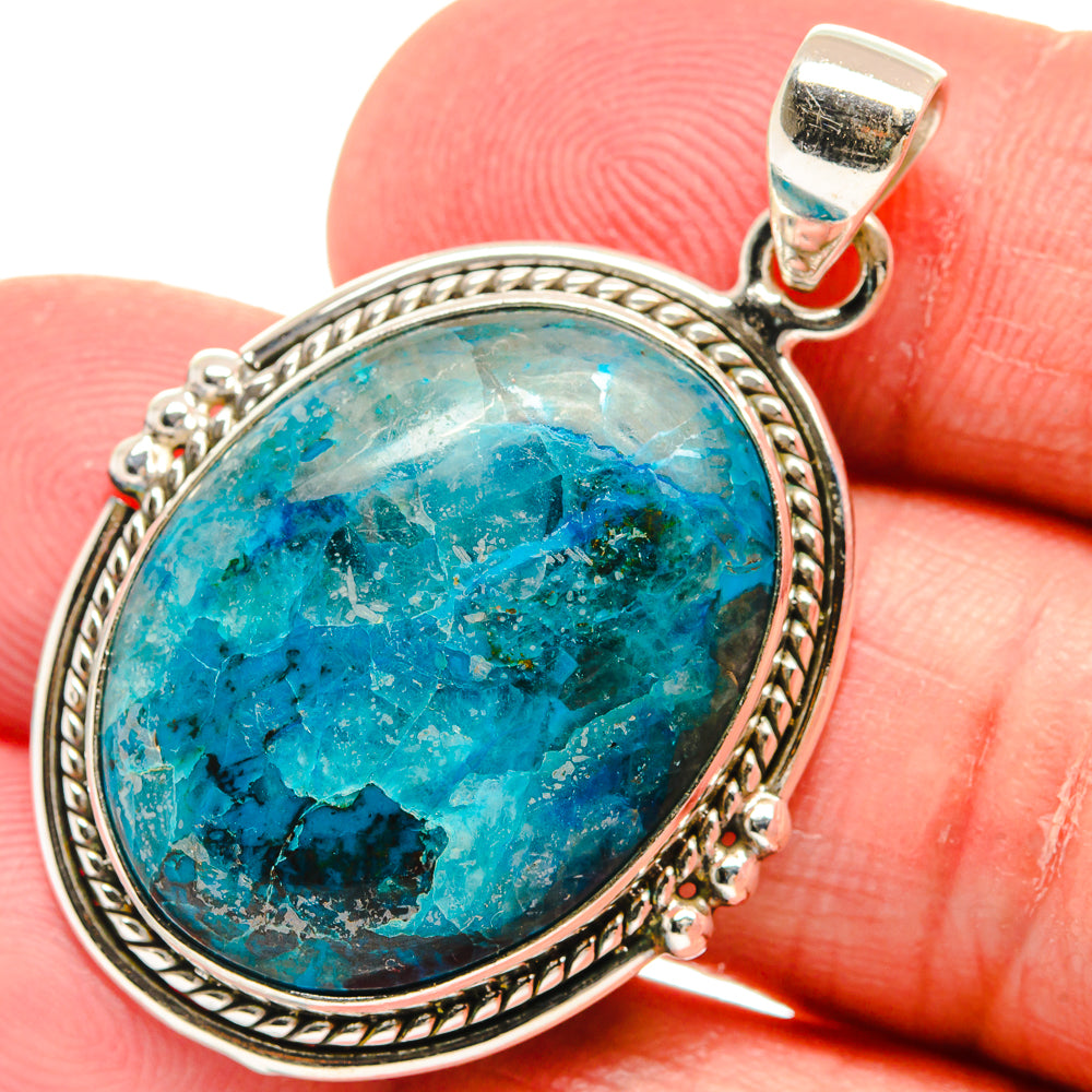 Oval chrysocolla pendant, sterling silver bezel with rope border and blue-green stone