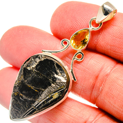 Sterling silver pendant with rough black shungite and yellow citrine accents, teardrop