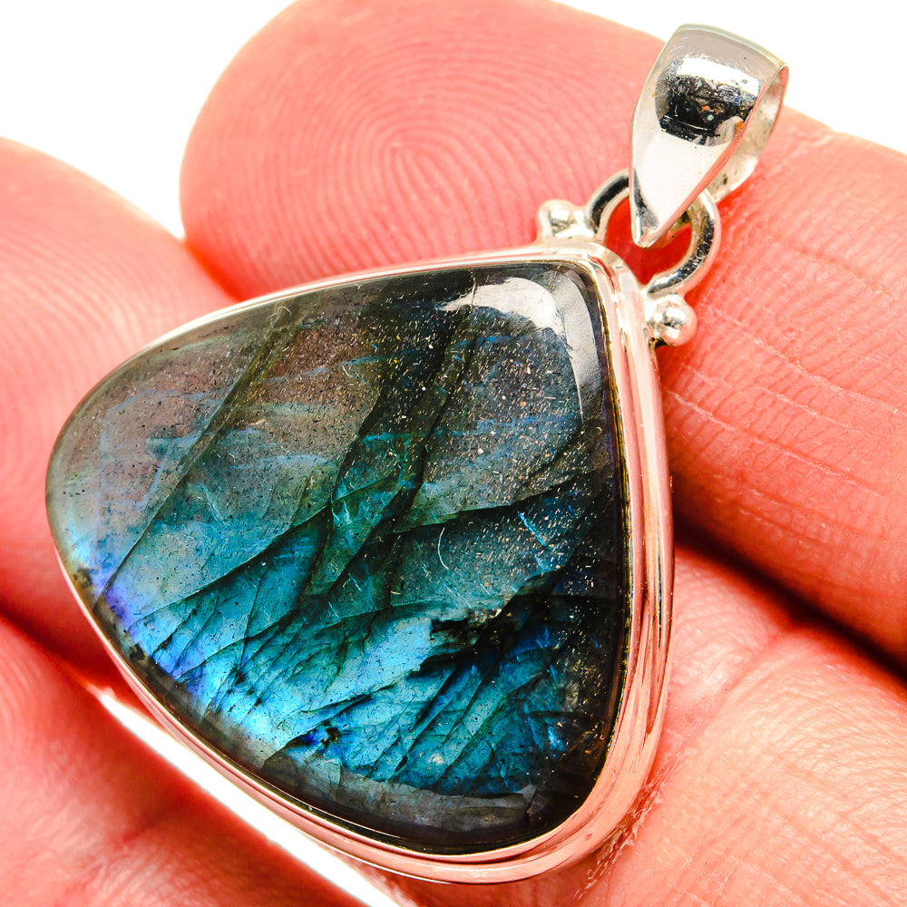 Sterling silver labradorite pendant with teardrop blue-green iridescent stone cabochon