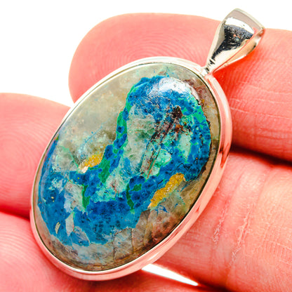 Oval silver pendant with blue and green chrysocolla stone, polished bail