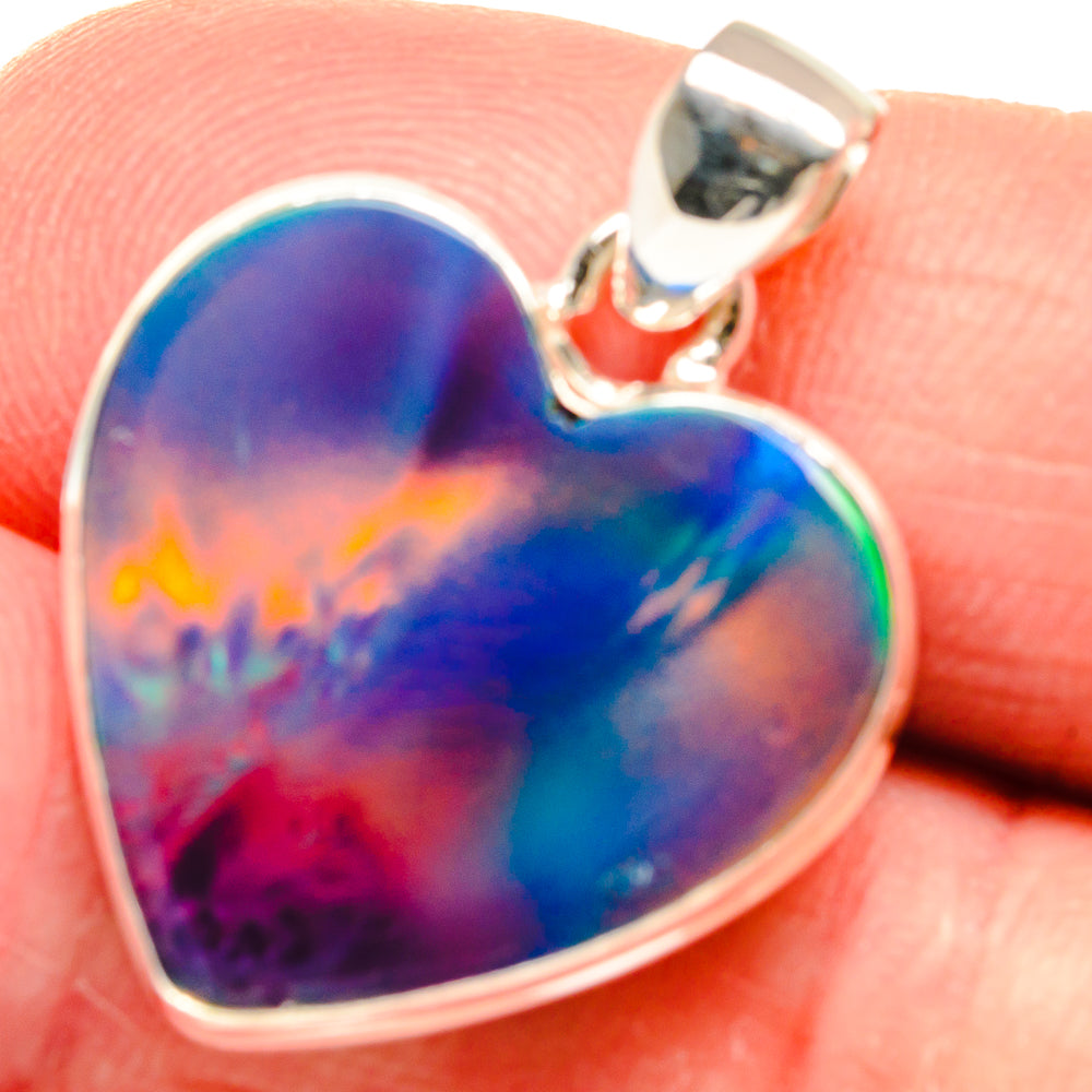Heart-shaped opal pendant in sterling silver, iridescent blue-purple-red glow
