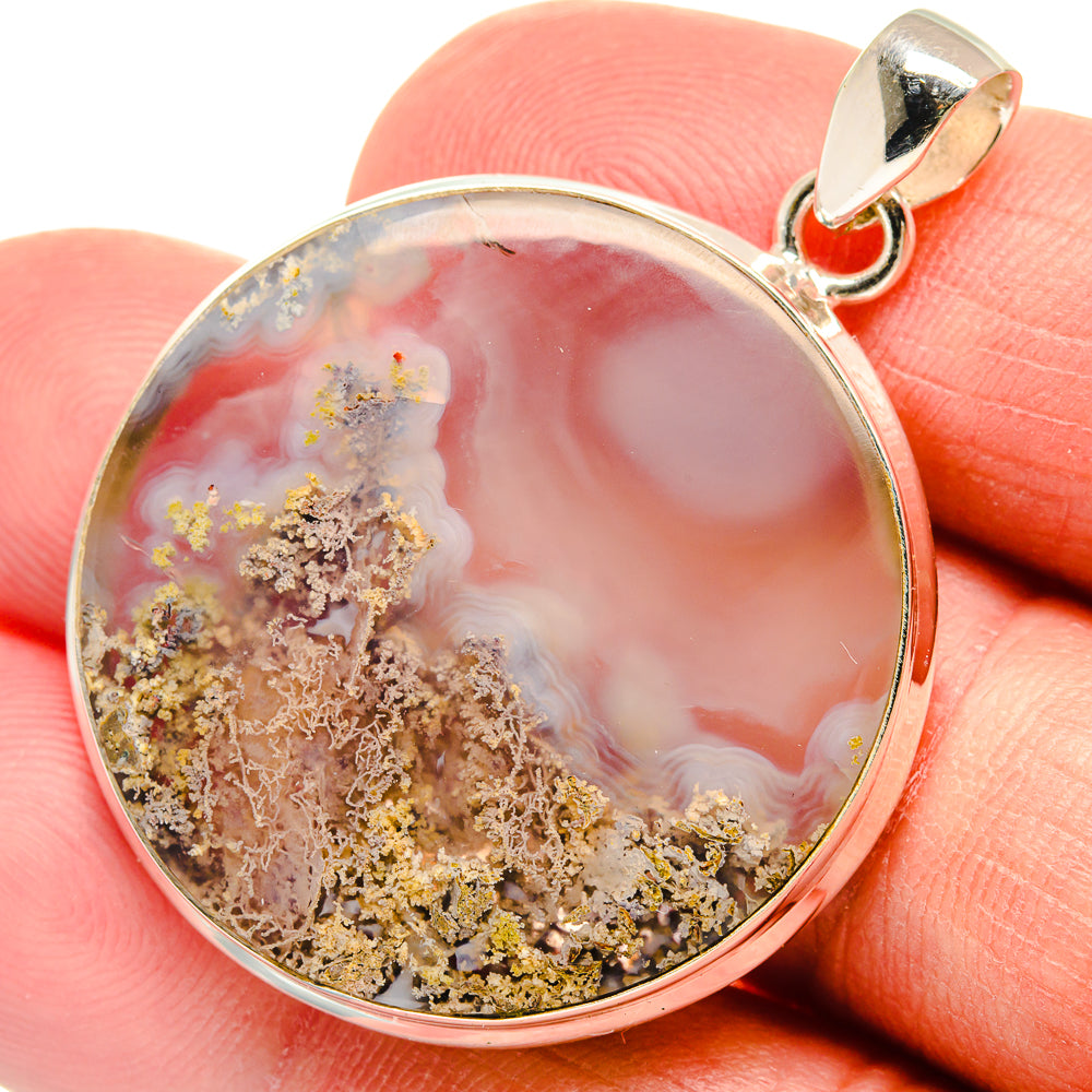 Sterling silver plume agate pendant, round peach stone with gold-brown plume inclusions