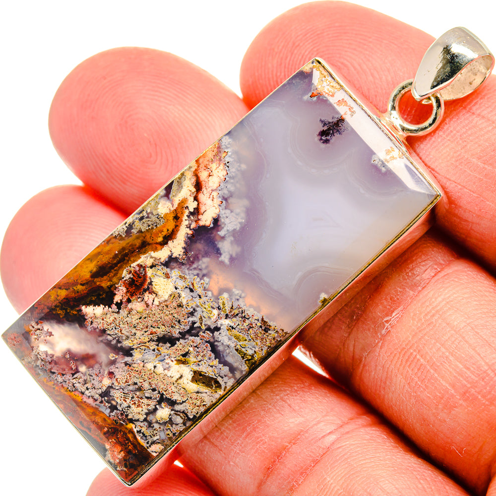 Rectangle plume agate pendant with silver bail, purple and gold marbled stone.