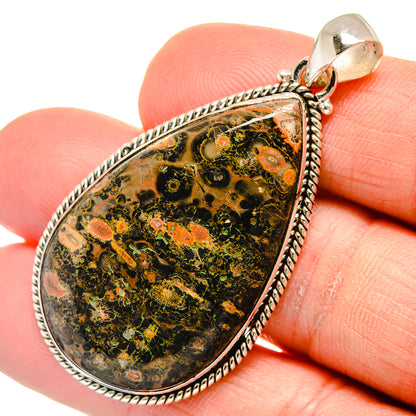 925 sterling silver teardrop pendant with dark obsidian stone and fiery speckled pattern