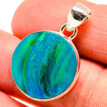 Round blue-green opal pendant in 925 sterling silver bezel, viewed on hand