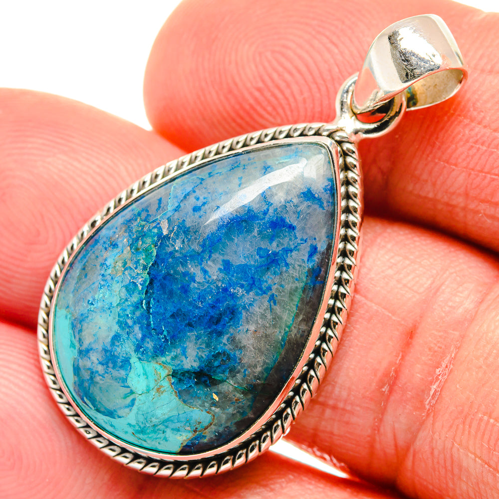 Blue chrysocolla-in-quartz teardrop pendant in sterling silver with rope bezel and bail