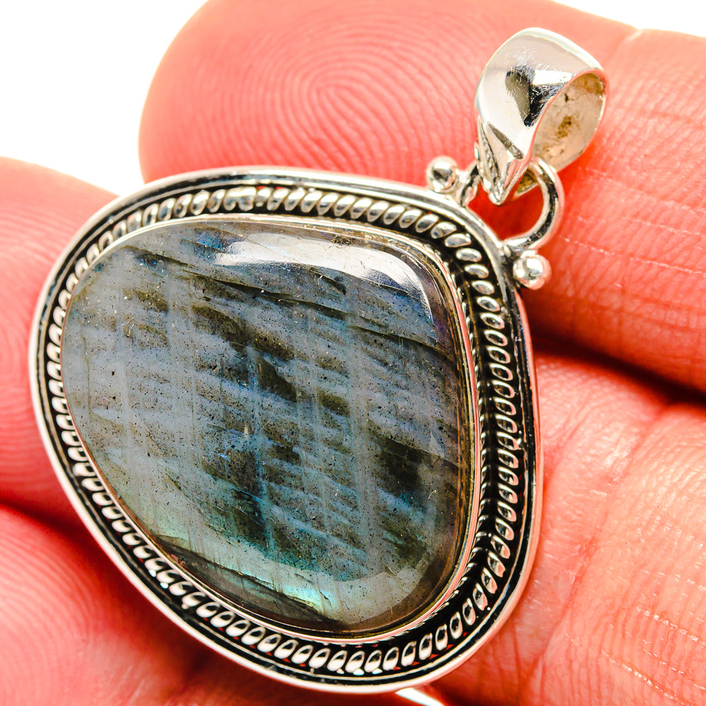 Labradorite pendant in 925 sterling silver bezel with blue-green gemstone flash