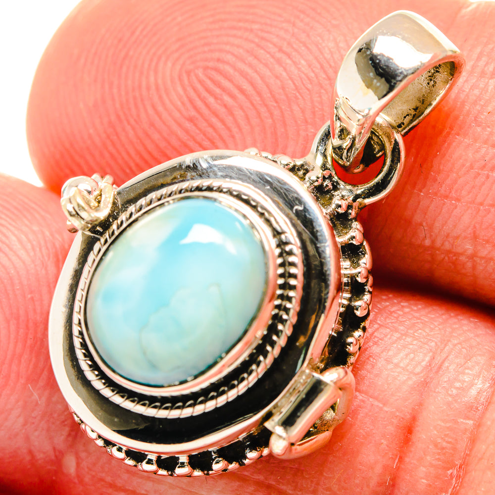 Oval larimar pendant in 925 sterling silver, blue cabochon framed by rope and beadwork