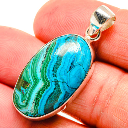 Oval blue-green stone pendant on 925 sterling silver bail, close-up