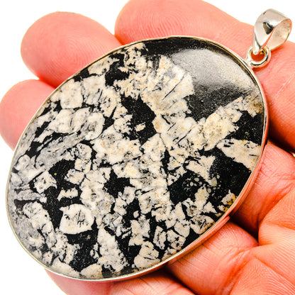 Chrysanthemum stone pendant with silver bail, large black-and-white speckled teardrop cabochon