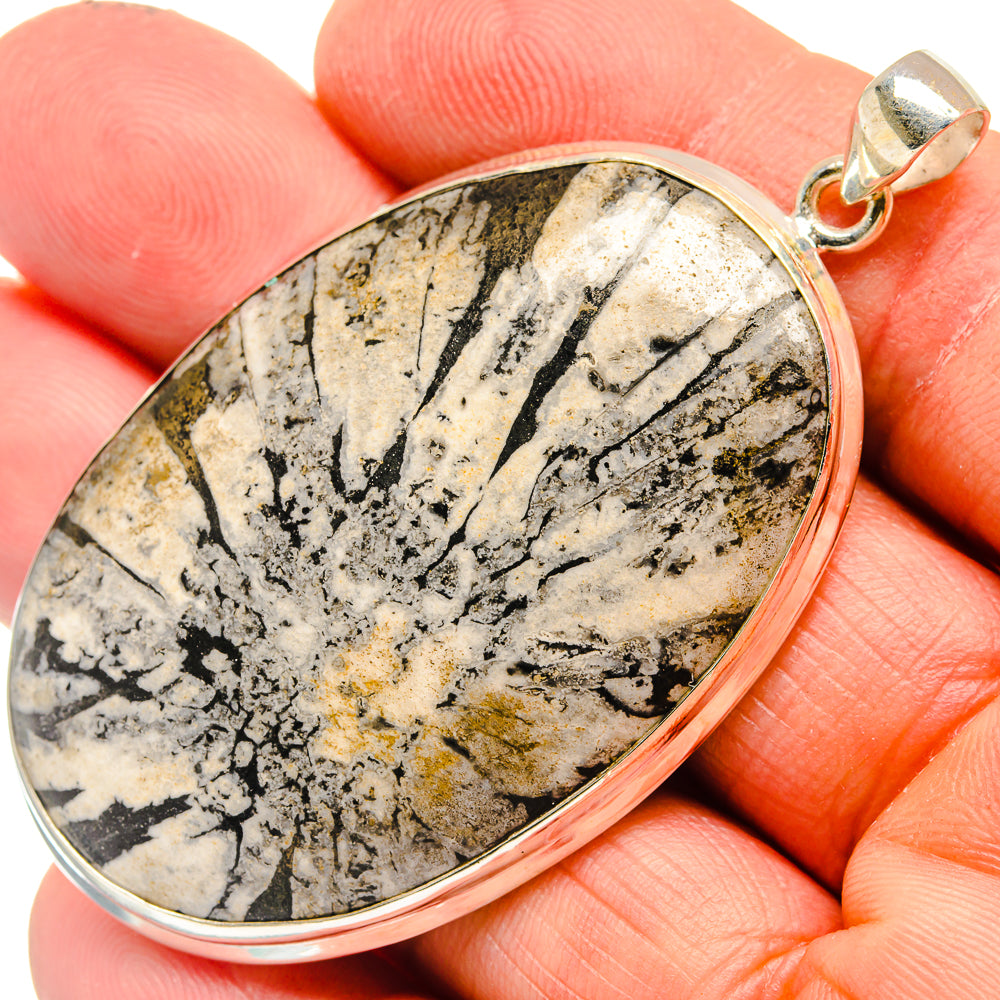Large teardrop stone pendant, gold-and-black speckled jasper in silver bezel