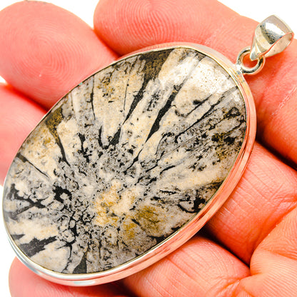 Large teardrop stone pendant, gold-and-black speckled jasper in silver bezel