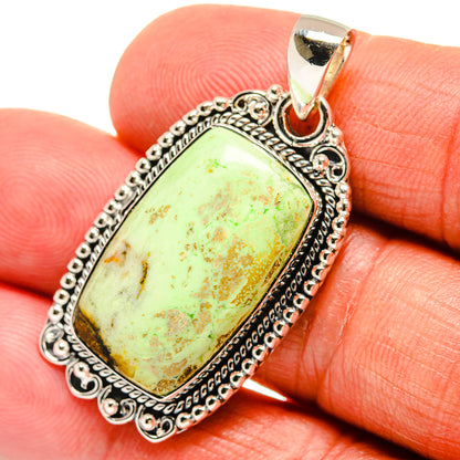 Sterling silver chrysoprase pendant with bail detail and oval mottled green-yellow stone