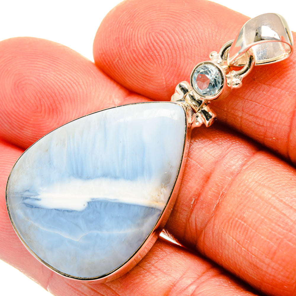 Opal teardrop pendant with blue topaz stone and 925 sterling silver bail