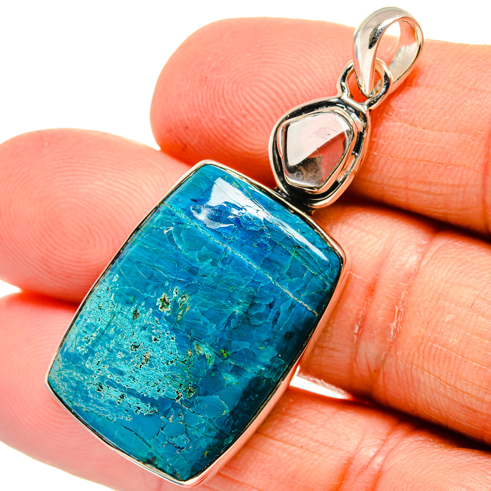 Blue-green square gemstone pendant in silver bezel with loop bail