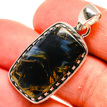 Pietersite pendant with dark blue-black stone, gold veining, silver bezel and bail