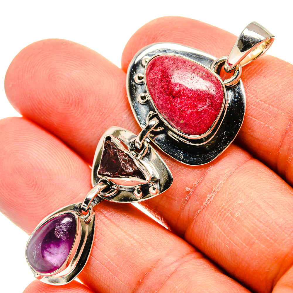 Sterling silver pendant with red oval cabochon and purple teardrop charm below