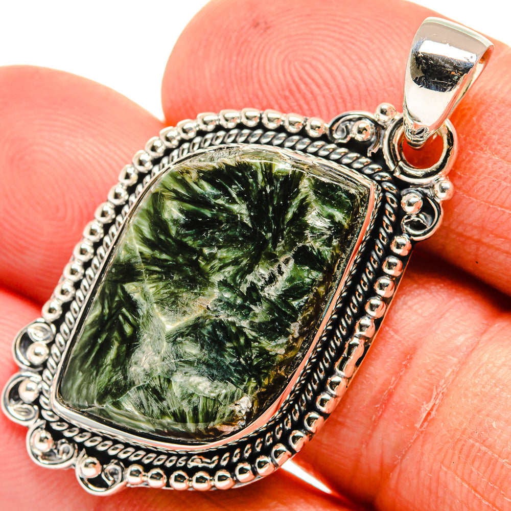 Green seraphinite pendant close-up with detailed 925 sterling silver bail and frame