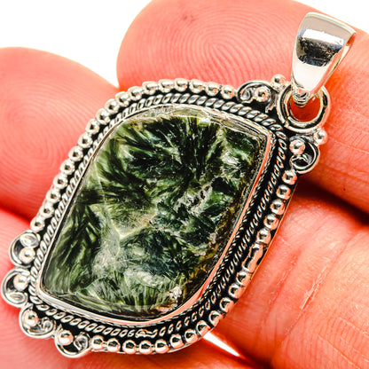 Green seraphinite pendant close-up with detailed 925 sterling silver bail and frame