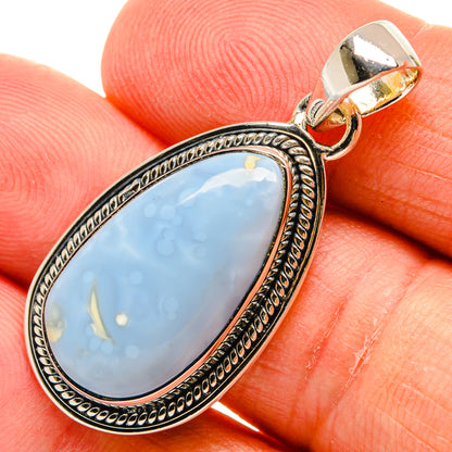 Oval blue opal pendant with detailed rope border and 925 sterling silver bail