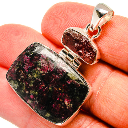 925 sterling silver pendant with orange carnelian and mottled eudialyte stone