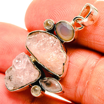 Rough rose quartz pendant in 925 sterling silver with rough pink stones and faceted accents