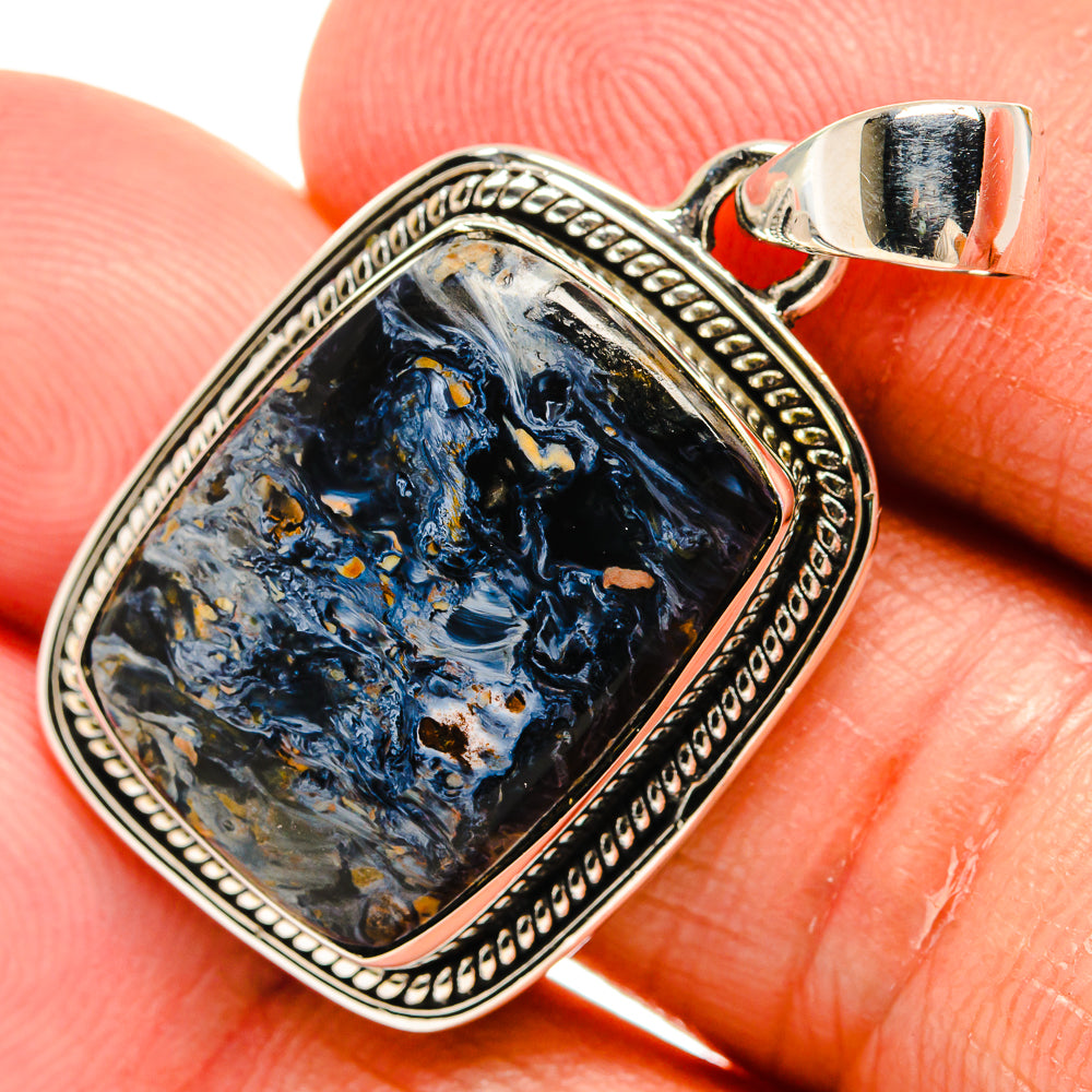 Sterling silver pietersite pendant with blue-gold mottled stone, bezel setting