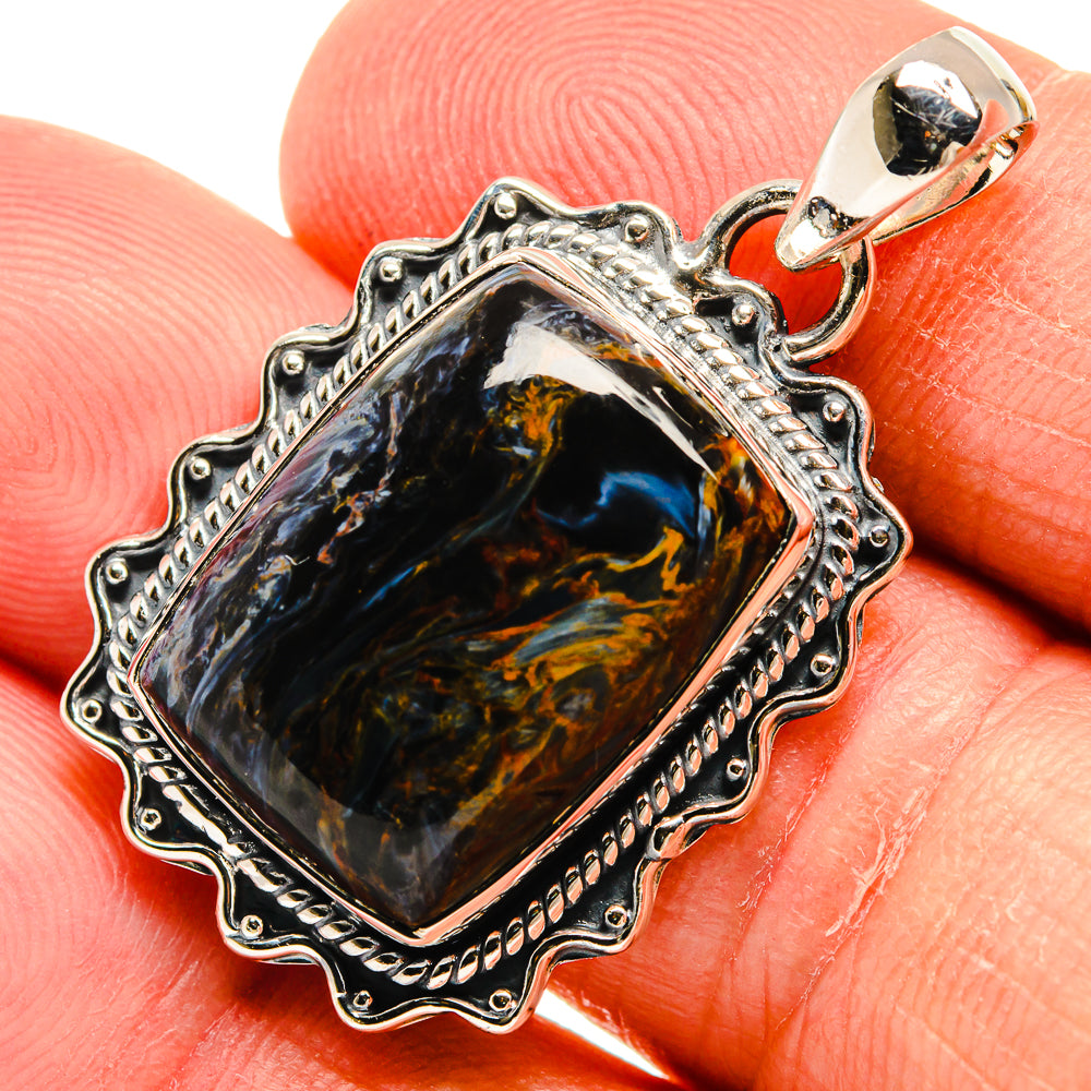 Pietersite pendant in 925 sterling silver with rectangular dark stone and bead border