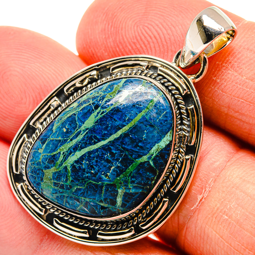 Oval azurite blue stone pendant in ornate 925 sterling silver bezel with loop bail