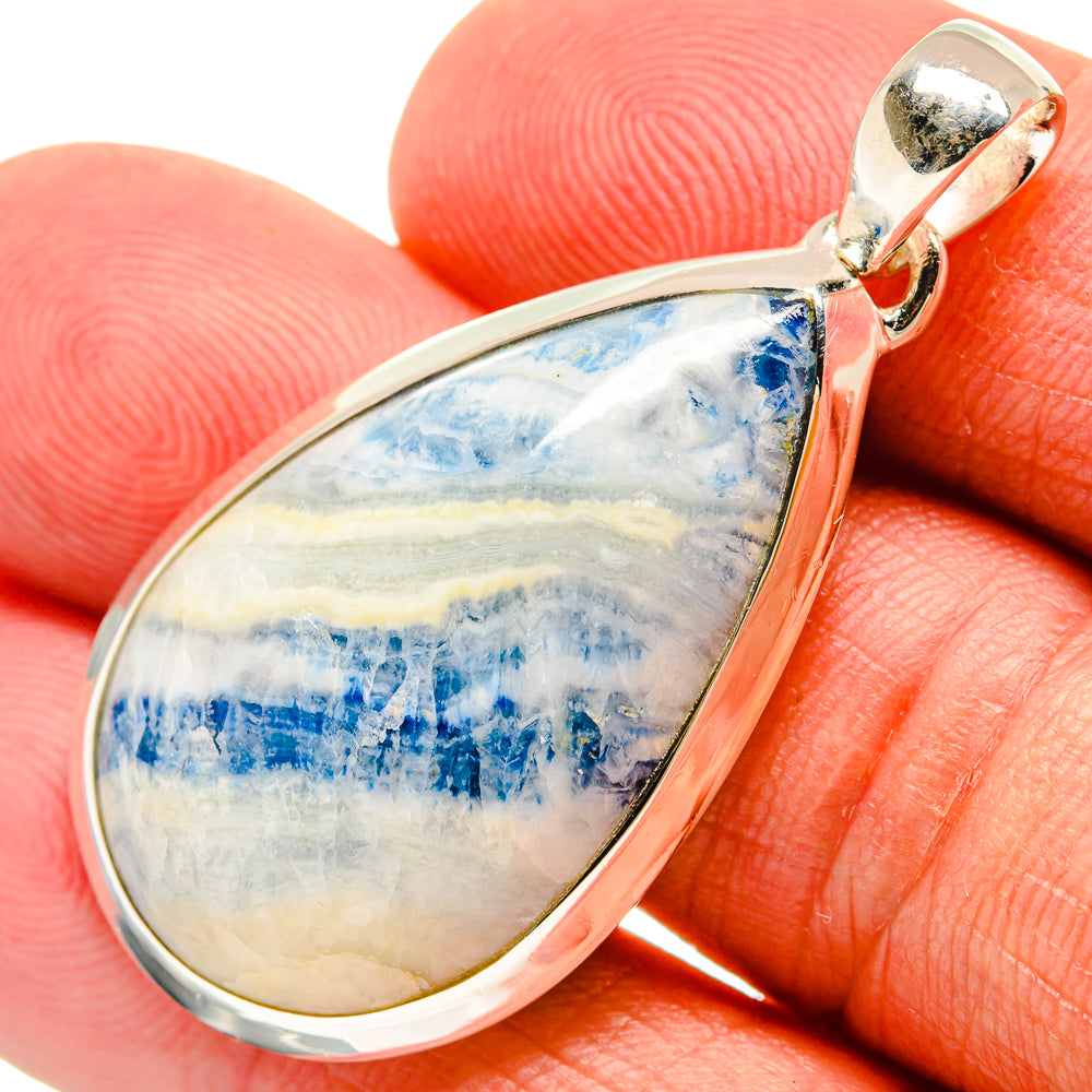 Blue scheelite teardrop pendant in 925 sterling silver bezel with bail