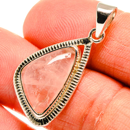 Rose quartz pendant with teardrop pink stone in ornate 925 sterling silver setting