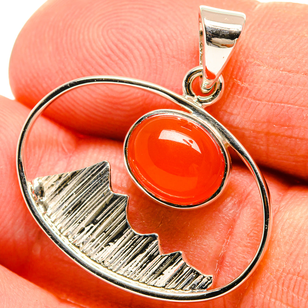 925 sterling silver pendant with orange oval carnelian and city skyline cutout