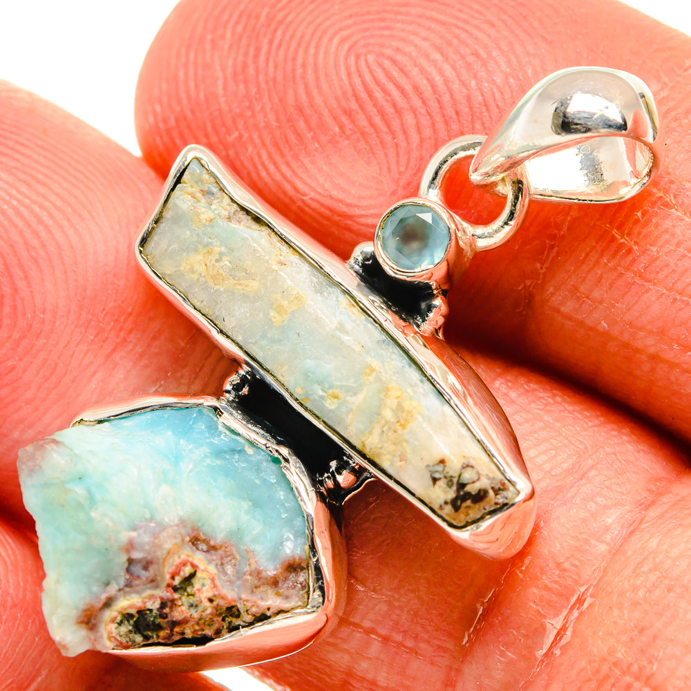 Sterling silver pendant close-up with aqua chalcedony bar, round bezel stone, bail