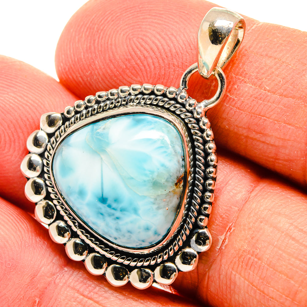 Sterling silver Larimar pendant with oval blue stone and beaded edge, bail top loop