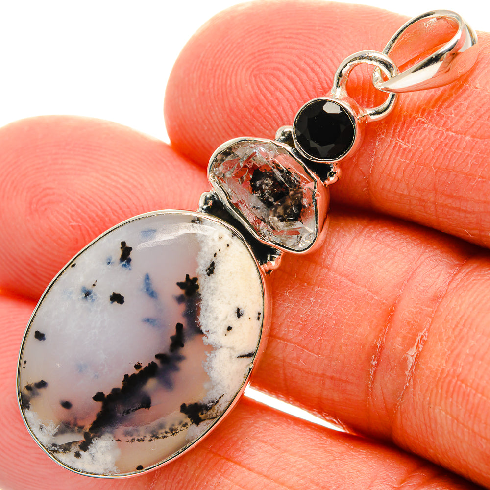 Oval dendritic opal pendant on sterling silver with black onyx and clear crystal bezel
