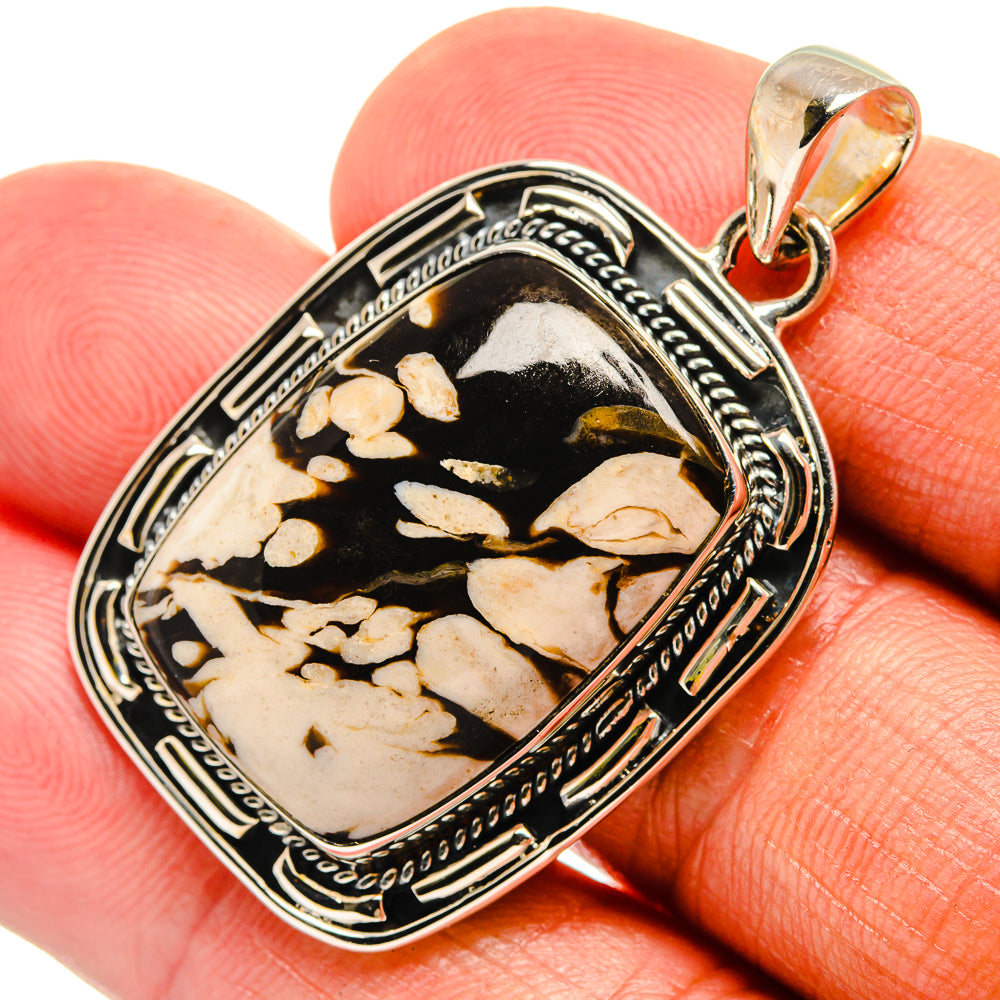 Sterling silver jasper pendant with square frame and black-and-beige stone, bail top