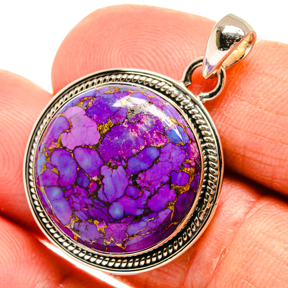 Purple turquoise cabochon pendant with ornate sterling silver bezel and bail
