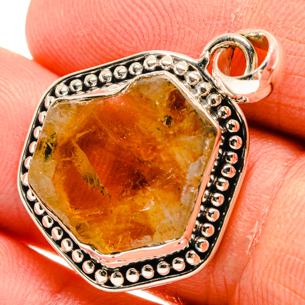 Rough orange citrine pendant in 925 sterling silver with beaded border and round loop bail
