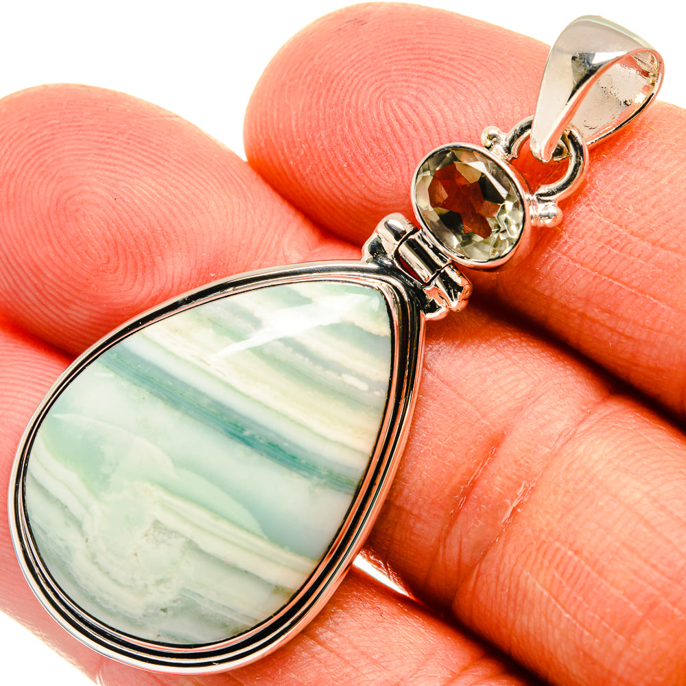 Ocean jasper teardrop pendant with green-white banding, sterling silver setting and round top stone