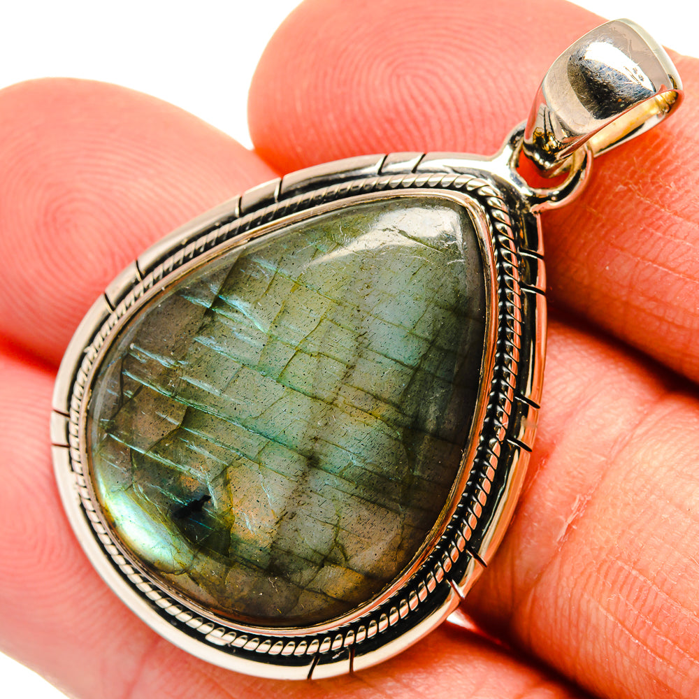 Teardrop labradorite pendant with rope-edged 925 sterling silver setting, green-blue shimmer