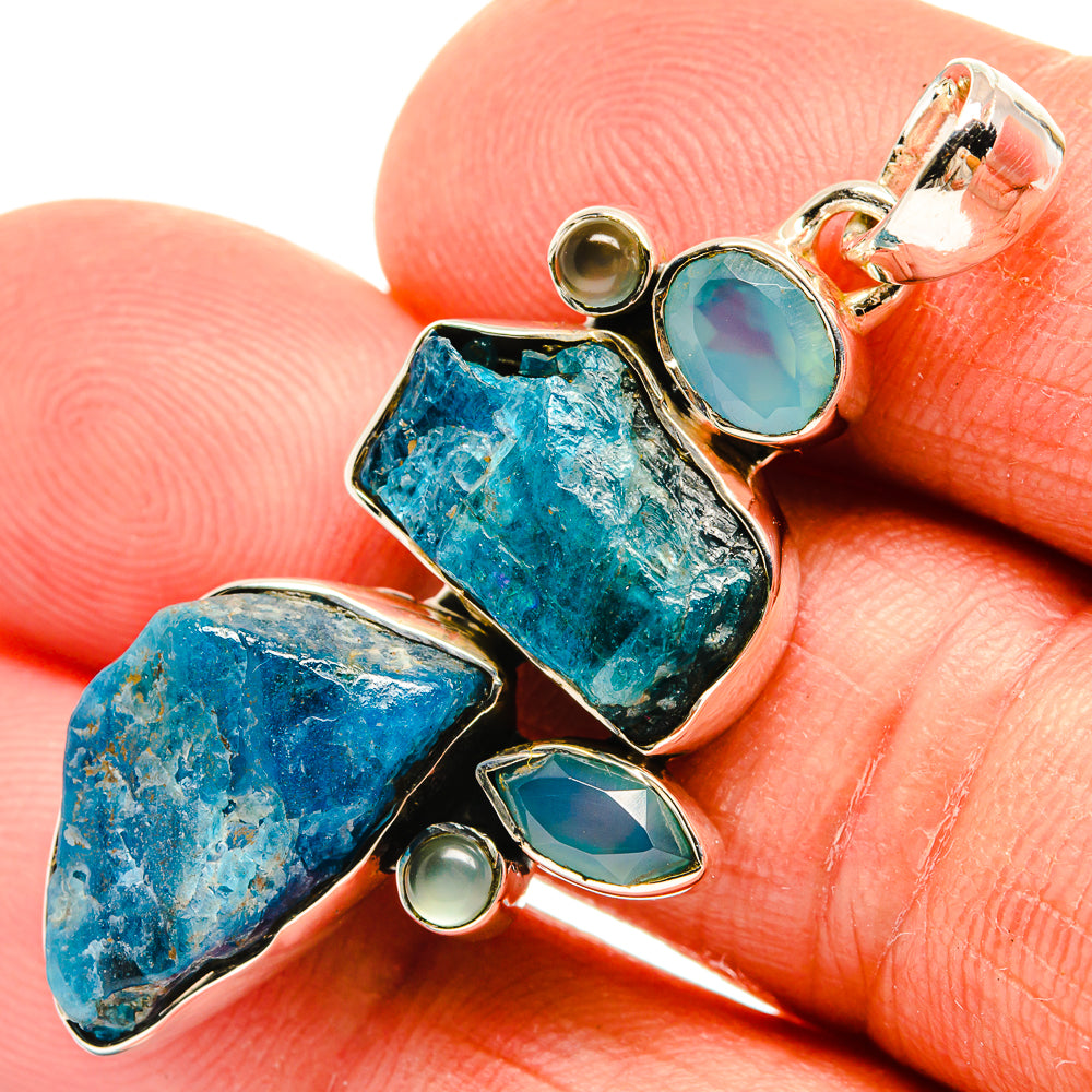 925 silver pendant close-up with rough aqua chalcedony, blue stones, and small accents