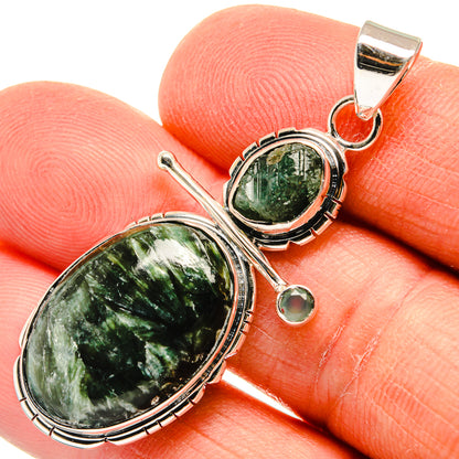 925 sterling silver pendant: oval green stone with small round accents