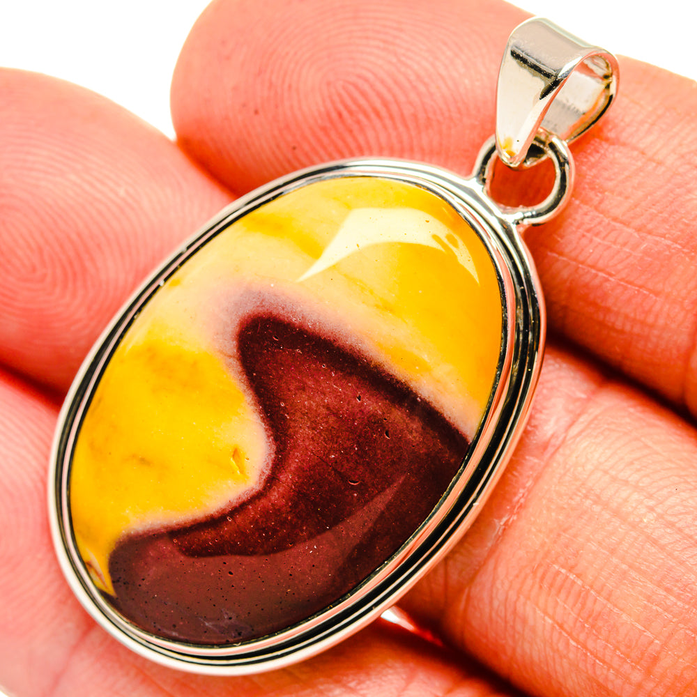 Oval mookaite stone pendant with marbled yellow and red, sterling silver bail