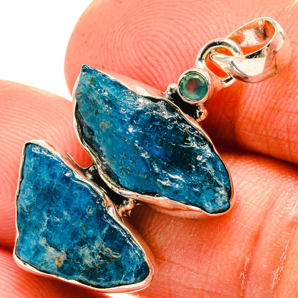 Rough aqua chalcedony pendant close-up on 925 sterling silver bail with green stone