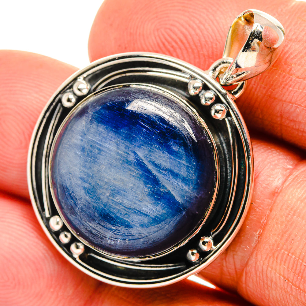 925 sterling silver pendant with round blue kyanite gemstone in layered bezel setting