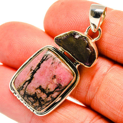 Sterling silver rhodonite and garnet pendant with rectangular pink cabochon and dark stone