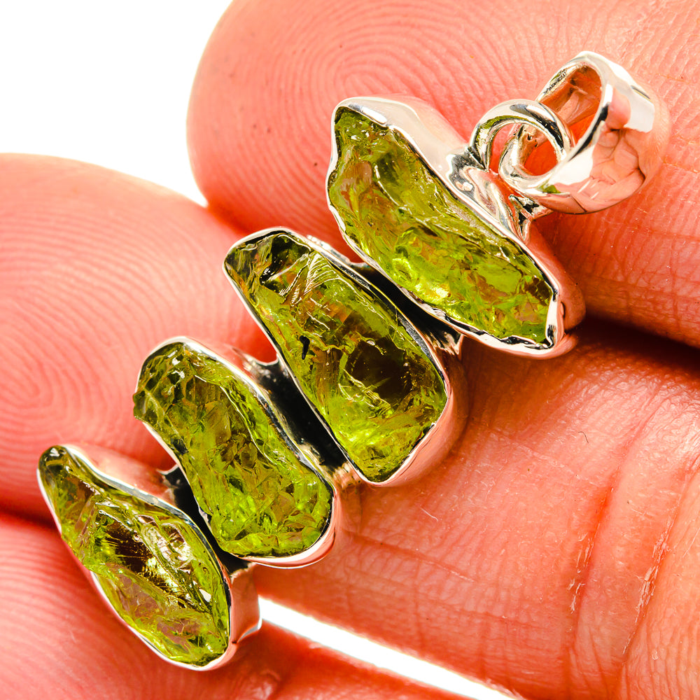 Rough green peridot pendant with three textured stones in polished 925 sterling silver